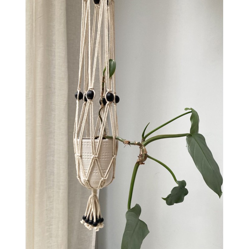 White, macramé, cotton hanger with black, wooden beads White, macramé, cotton hanger with black, wooden beads