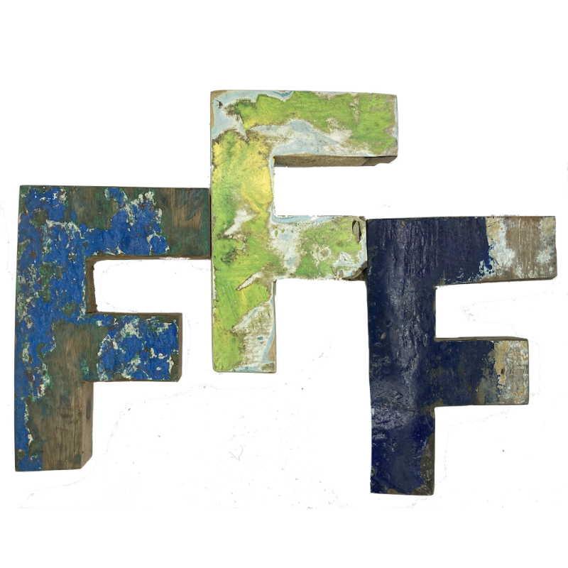 Wooden letter F made out of old fishing boats
