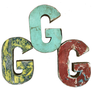 Wooden letter G made out of old fishing boats