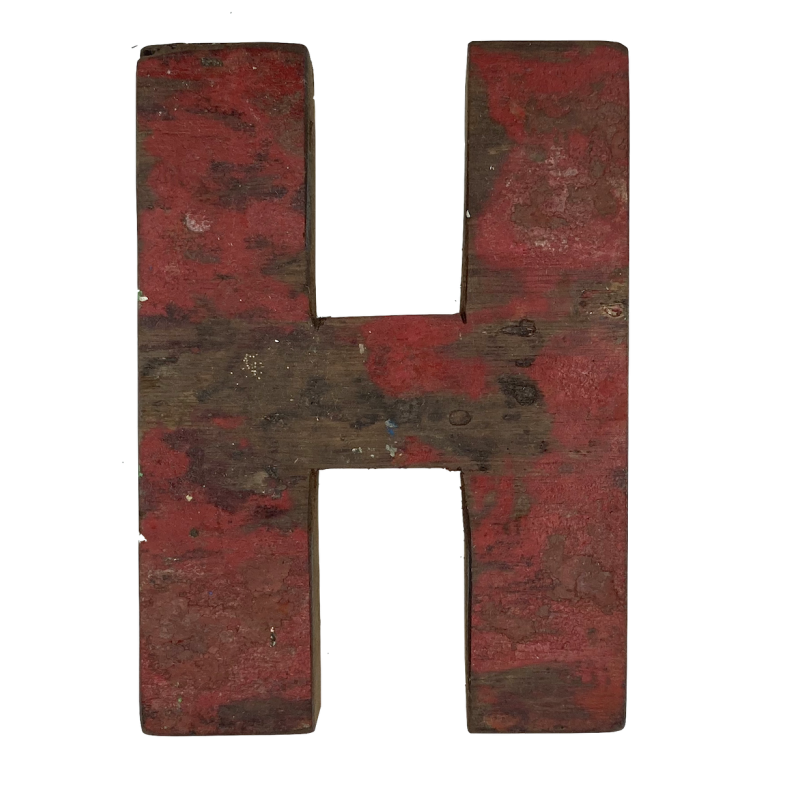 Wooden letter H made out of old fishing boats