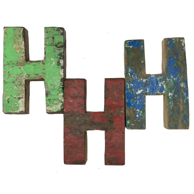 Wooden letter H made out of old fishing boats