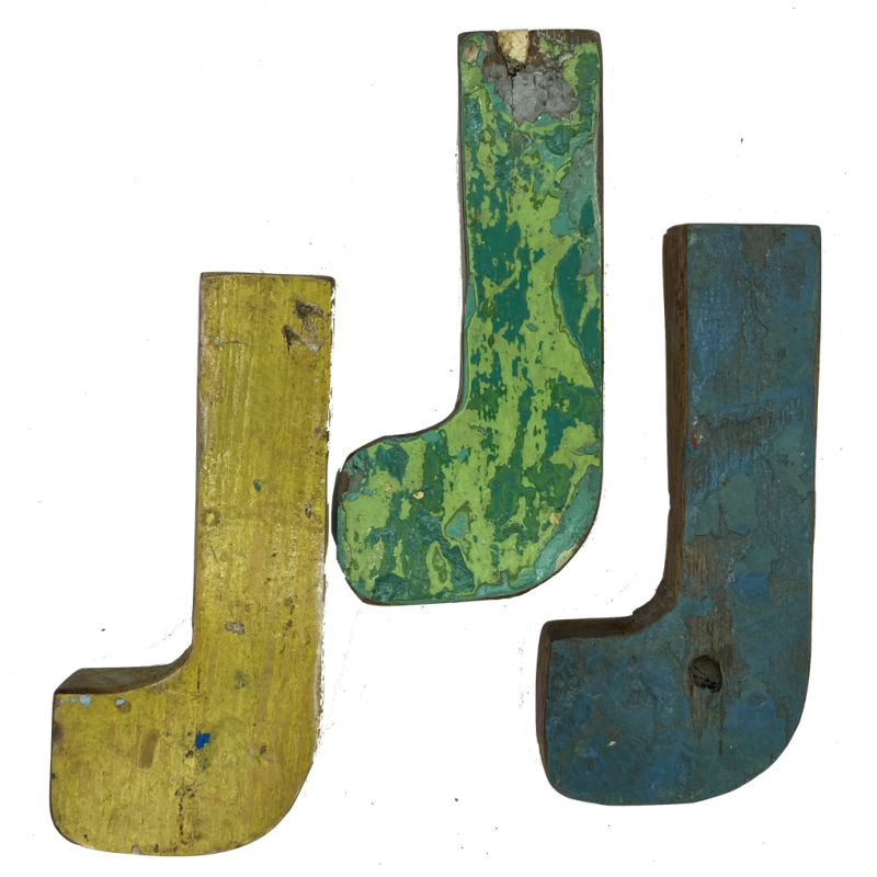 Wooden letter F made out of old fishing boats