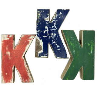 Wooden letter K made out of old fishing boats