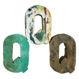Wooden letter Q made from old fishing boats