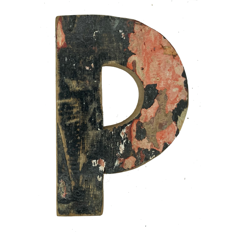 Wooden letter P made out of old fishing boats