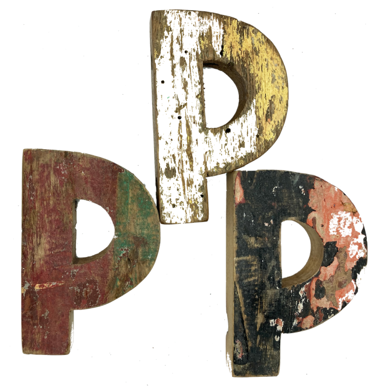 Wooden letter P made out of old fishing boats