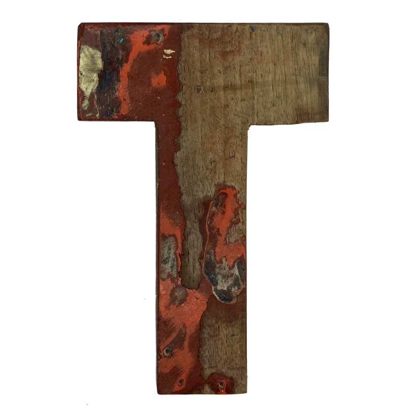 Wooden letter T made out of old fishing boats