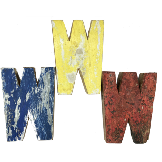 Wooden letter W made out of old fishing boats
