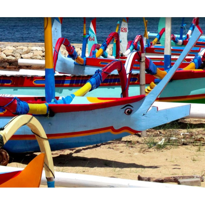 Wooden letter W made out of old fishing boats