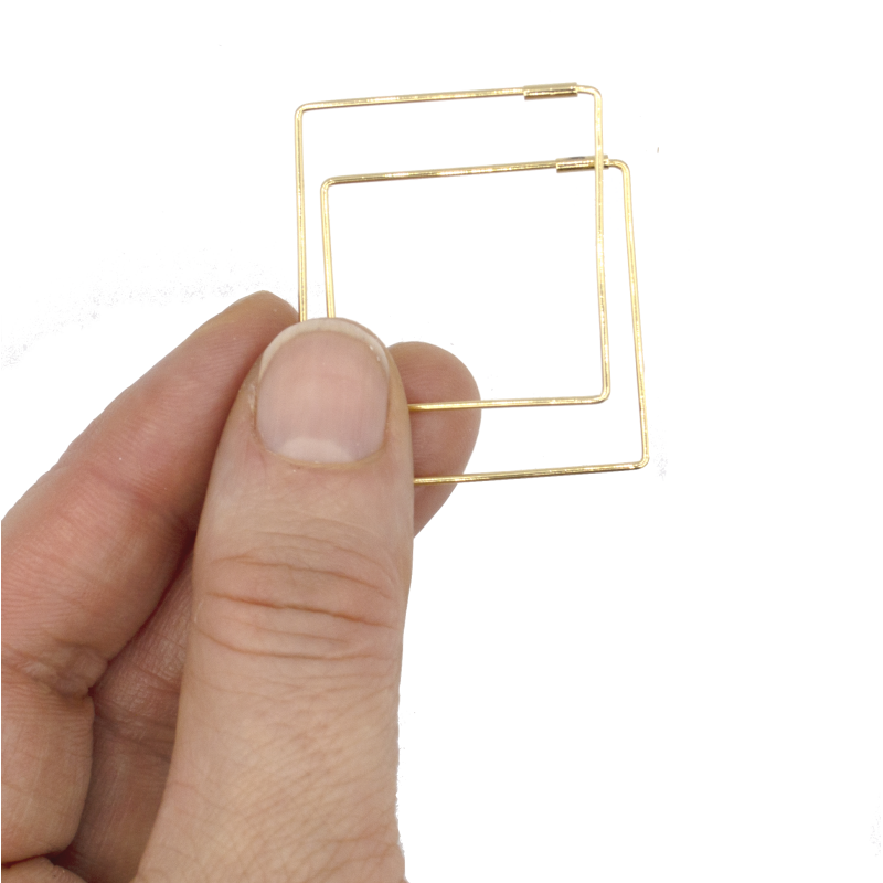 De goud vergulde oorbellen Sibyl De goud vergulde oorbellen Sibyl