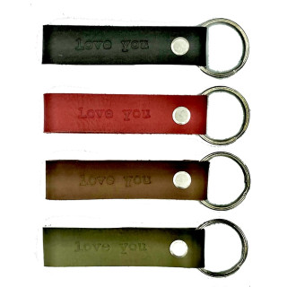 A leather key chain |A leather key chain with text LOVE YOU