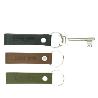A leather key chain |A leather key chain with text LOVE YOU