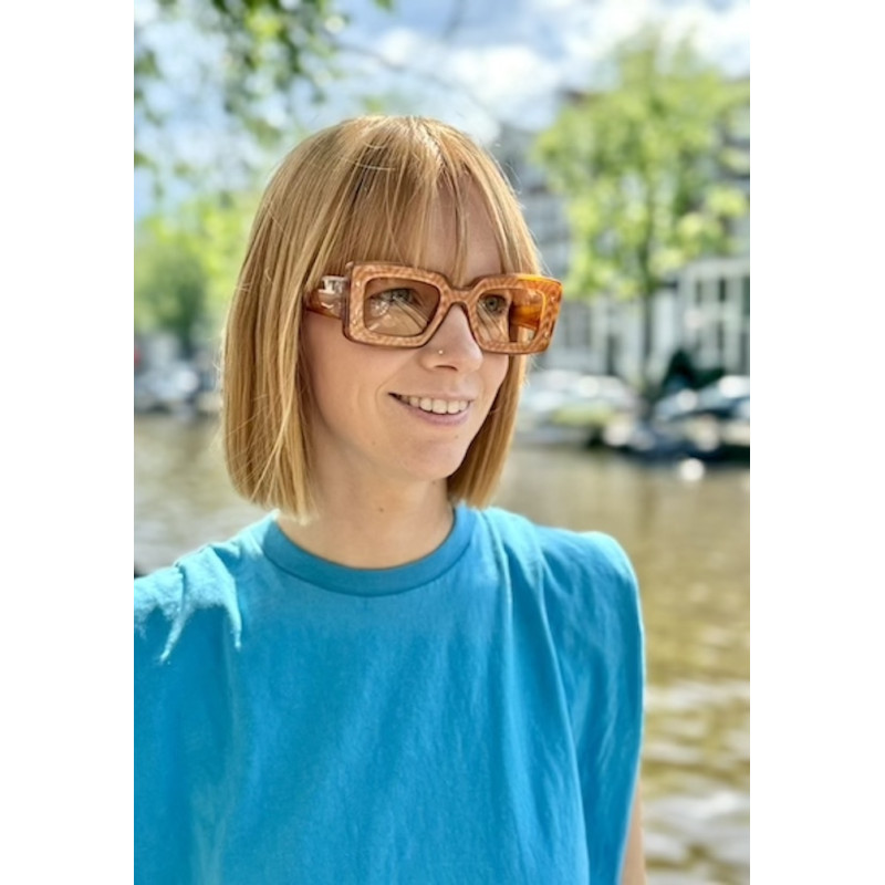 Sunglasses Elektrik | A mustard color sunglasses